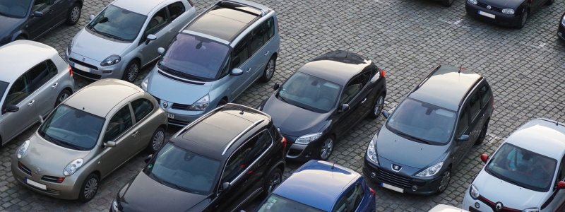 Rows of cars parked up.